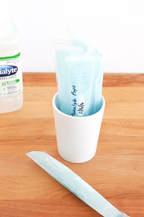 Make these Homemade Pedialyte Freezer Pops for an easy way to freeze the leftover Pedialyte you have in the container. Homemade Pedialyte Recipe, Homemade Pediasure, Electrolyte Popsicles Homemade, Pedialyte Popsicles, Homemade Freeze Pops Kids, Homemade Pedialyte, Freezer Pops, Way To Save Money, Popsicle Recipes