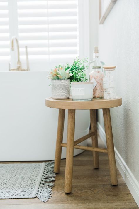 White cabinets. Floating Shelves. Shiplap. Transitional design. Vintage Feel. Quartz Countertops. Brass fixtures. Wall mount faucet. Freestanding Tub. Neutral Colors. Custom Cabinets. Vinyl Wood Planked Floor. Bathroom Side Table Ideas, Small Wood Stool Bathroom, Stools By Bathtub, Side Table For Bathroom, Bathroom Tables, Bathtub Side Table Ideas, Bathroom Accent Table, Shower Table, Tub Side Table