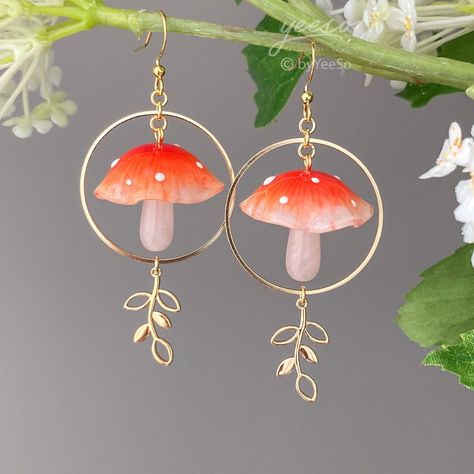 3D Magical red mushroom drop earrings - Cute mushroom leaf dangle earring - unique dangle  🤍 Hypoallergenic 🌸 Handmade with love ✨ Cute & Dainty 🎁 Gift ready 〰️Click👇🏻 Find more Earrings🎀 https://www.etsy.com/shop/byYeeSo ◽️ PACKAGING ◽️ * The jewelry will be nicely packaged * Comes with a drawstring suede pouch * If you need personalized gift note, please click the link below, add it to your cart when check out to upgrade your packaging. https://www.etsy.com/listing/1008661207/upgrade-gif Glass Mushroom Earrings, Cool Earrings Unique, Mushroom Clothing, Mushroom Earring, Earrings Mushroom, Earring Unique, Cottagecore Earrings, Magical Mushroom, Mushroom Jewelry