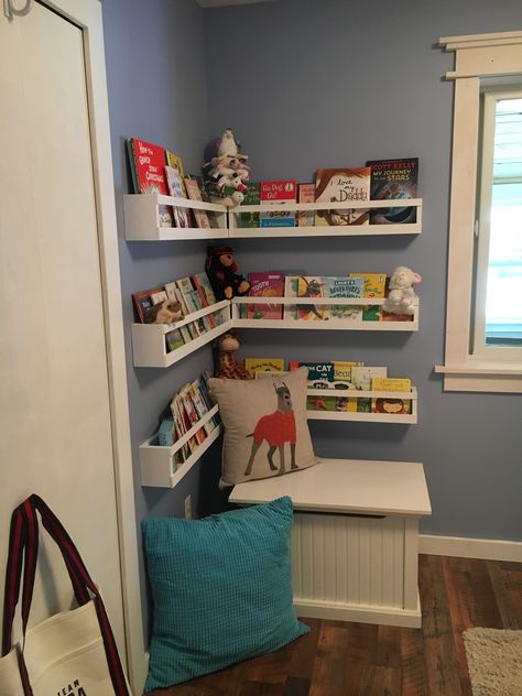 Gender neutral nursery corner bookshelves Nursery library Nursery Corner Bookshelf, Corner Bookshelves Nursery, Nursery Corner Shelves, Gender Neutral Fox Nursery, Corner Wall Bookshelves, Corner Nursery In Bedroom, Corner Library Bookshelves, Bookshelf For Nursery, Bookshelves Nursery