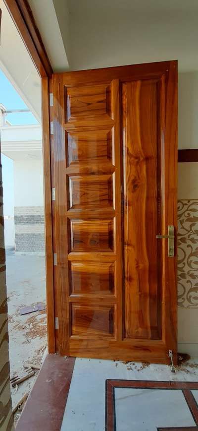 Designs by Contractor Zeeshan Naqvi, Delhi | Kolo Wooden Door Polish Colours, Main Door Single Door Designs, Door Polish Colour, Pu Polish Doors, Door Polish Wooden, Wooden Single Main Door Design, Wooden Single Door Design, Wooden Double Front Doors, Single Main Door Designs