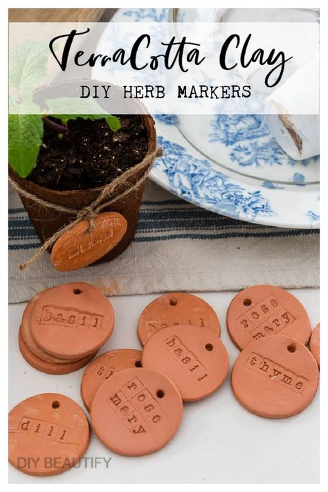 Create labeled herb markers using terracotta air dry clay and stamps. An easy project that is perfect for the garden, but makes a great gift too! Full tutorial at diybeautify.com! Air Dry Clay Herb Markers, Terra Cotta Air Dry Clay, Terracotta Air Dry Clay Ideas, Garden Upcycle, Crayola Air Dry Clay, Greenhouse And Garden, Herb Labels, Farmhouse Projects, Herb Markers