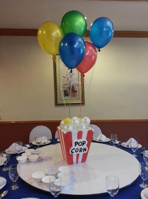 popcorn centerpiece Popcorn Bucket Centerpiece, Popcorn Centerpiece Ideas, Popcorn Centerpieces, Carnival Centerpieces, Joy Birthday, Bucket Centerpiece, Popcorn Theme, Carnival Decor, Circus Theme Party