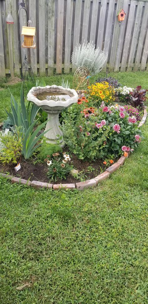 First time gardeningthe bee's and I are very happy with the result! Bird Bath Flower Bed Garden Ideas, Bird Bath Area Ideas, Garding Ideas For Home, Bird Area In Garden, Memorial Flower Garden Ideas, Memory Gardens Backyard, Pet Grave Ideas Memorial Gardens, Bird Bath Garden Flower Beds, Bird Bath Landscaping