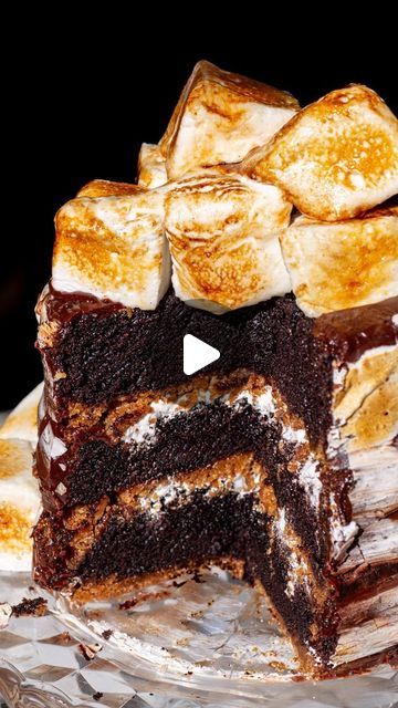 Maddie & Jules on Instagram: "S’MORES CAKE is all the components of a s’more layered into a cake.

Full s’mores cake recipe linked in bio or at https://kitchen-by-the-sea.com/smores-cake/

Ingredients:
Chocolate Ganache:
5 oz dark chocolate
¾ cup heavy cream
3/4 cup sugar
5 tablespoons softened butter
½ teaspoon salt
½ teaspoon vanilla

Crust:
1 ½ sticks butter melted
2 ½ cups graham cracker crumbs 15 sheets a little less than 2 packages that come in a box of 3
¼ cup sugar
½ teaspoon salt

Chocolate Cake:
1 ¾ cups all purpose flour 210 g
2 cups sugar 400 g
¾ cup cocoa 75 g
2 teaspoons baking soda 10 ml
1 teaspoon baking powder 5 ml
1 teaspoon salt 5 ml
2 eggs
2 teaspoons vanilla extract 10 ml
1 cup buttermilk 240 ml
½ cup oil canola or vegetable 120 ml
1 cup hot coffee 240 ml

Marshmallow Smores Dessert, Smores Cake, Full Recipes, Food Substitutions, Salted Chocolate, Eat Dessert First, Yummy Eats, Graham Cracker Crumbs, Cake Ingredients