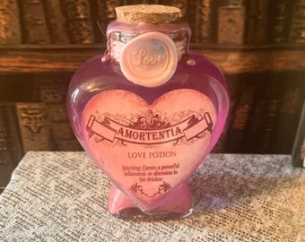 Love Potion Aesthetic, Potion Aesthetic, Pink Potion, Harry Potter References, Love Potions, Anne Movie, Love Heart Images, Potion Bottles, Jewelry Aesthetic