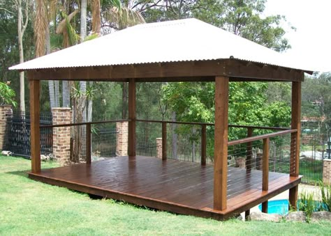 Hillside deck Australian Pool, Hillside Deck, Bali Hut, Bali Huts, Gazebo On Deck, Deck Outdoor, Diy Gazebo, Australian Country, Carport Plans