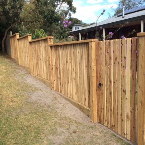 Fence For Sloped Yard, Sloping Fence, Sloped Landscape, Coastal Creations, Backyard Retaining Walls, Wood Picket Fence, Terraced Backyard, Wood Fence Design, Design Backyard