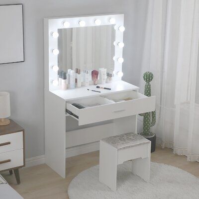 Vanity Set With Lighted Mirror Cushioned Stool Dressing Table Vanity Makeup Table Description: 100% brand new and high quality. Light bulb: Energy-saving light bulb is easy to illuminate and has good imaging effect HD mirror: fine selection of high-definition makeup mirror, not easy to scratch Plus tabletop: widened countertop design for jewellery, hair accessories, nail polish, hair care products and cosmetics Storage drawer: double storage drawers, can be placed to meet your needs Easy to asse Mirror Drawers, Makeup Vanity Set, Mirror Stool, Dressing Table Vanity, Vanity Table Set, Makeup Table Vanity, Lighted Mirror, Vanity Set With Mirror, Countertop Design