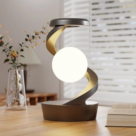 Rotating Moon Desk Wireless Charging Lamp👇 This rotating and suspended night light adopts a new design and production process. Using stepless dimming, the light is very soft. You can change the lighting to your. The lights can be switched on and off by induction, which is very convenient. It also has a wireless charging function for mobile phones, which is very convenient. [Easy to operate] This gravity suspension light can be and off at any time with just one click, which is very convenient... Charging Lamp, Wireless Charging Lamp, Suspension Light, News Design, Production Process, New Design, Mobile Phones, Gravity, Wireless Charging