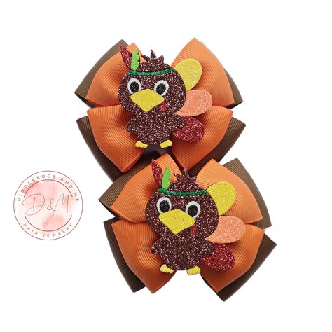 These are the cutest turkey Thanksgiving hair bows.  Bows are double layer and is made with orange and brown grosgrain ribbon. In the center of each bow, you will find an  adorable glitter turkey. They are made with your choice of hair clips and are partially lined with grosgrain ribbon.  All ribbon ends have been heat  sealed to prevent fraying.  Bows measure about 3.50 inches long. Always use supervision while little ones are  wearing hair accessories as they may contain small parts that could Turkey Hair Bow, Turkey Bow, Thanksgiving Hair Bows, Thanksgiving Bow, Fall Hair Bow, Thanksgiving Hair, Pigtail Bows, Girls Holiday, Ribbon Ends