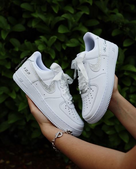 Stepping into forever with a touch of sparkle. ✨ Our custom Air Force 1 low bridal sneakers are the perfect blend of style and comfort for your special day. 👟💐. . . . . . . #BridalSneakers #CustomKicks #bridetobe #bride #weddingideas #weddingstyle #bridalshoes #bridestyle #bridesmaids #bridesmaid #nike #rhinestones #satin #airforce1 #customsneakers #sneakernews Sneakers For Bride, Wedding Sneakers For Bride, Shoes Air Force, Jordan Wedding, Bride Personalized, Bridal Sneakers, Wedding Sneakers, Custom Kicks, Wedding Hands