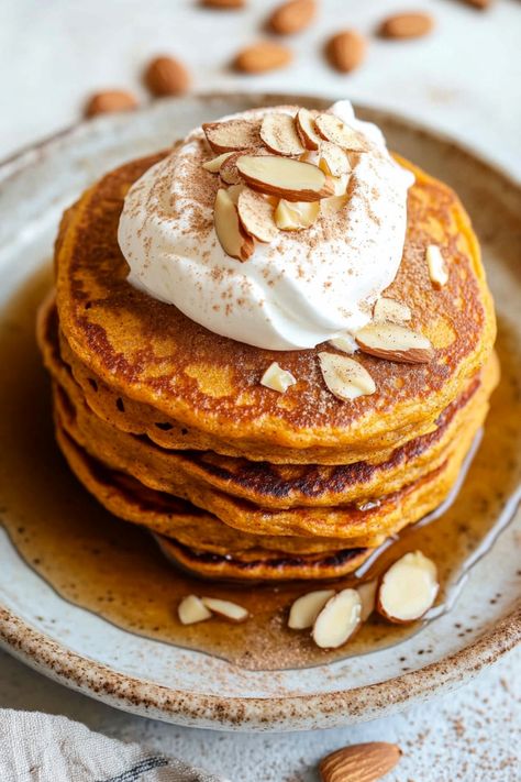 Delight your taste buds with delicious and nutritious butternut squash pancakes. This unique twist on a classic breakfast favorite is perfect for a cozy morning at home or a holiday brunch with loved ones. These pancakes are fluffy, flavorful, and packed with vitamins and fiber from the butternut squash. Whether you top them with maple syrup, whipped cream, or fresh fruit, these pancakes are sure to become a new family-favorite recipe. Spaghetti Squash Pancakes, Butternut Squash Dessert, Butternut Squash Pancakes, Squash Pancakes, Butternut Squash Cinnamon, Butternut Squash Puree, Yogurt Pancakes, Cozy Morning, Classic Breakfast