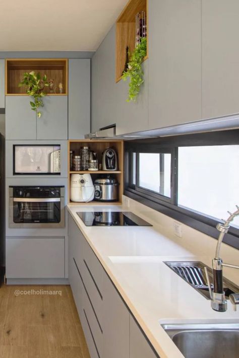 Discover the art of maximizing kitchen space with our smart corner cabinet ideas 🌿🍽️. This sleek design isn't just about saving space—it's about creating a flow that works for you. The blend of cool gray tones and warm wood details offers both function and form, turning a small corner into the heart of your home. Hungry for more ingenious kitchen hacks? Click to find out how to transform your kitchen corners into stylish, space-saving wonders! #GoTinySpace #CornerKitchenCabinetIdeas Shelves Layout, Luxury Layout, Pantry Rustic, Corner Kitchen Layout, Kitchen Layout Design, Small Kitchen Layout, Luxury Houses Kitchen, Island Layout, Kitchen Open Shelves