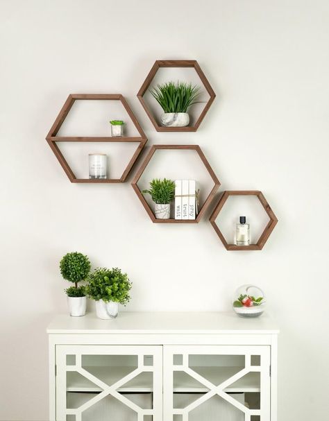 Just because you live in an apartment or small space doesn’t mean it has to be cluttered or disorganized. Check out these clever apartment organization hacks to make the most of your small-yet-mighty home. Octagon Shelves, Hexagon Floating Shelves, Apartment Hacks Organizing, Hexagon Shelf, Metal Floating Shelves, Rustic Wood Floating Shelves, Honeycomb Shelves, Geometric Shelves, Decorative Shelving