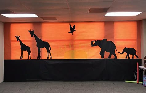 African Theme Classroom Ideas, Jungle Theme Library, Safari Prom Theme, Safari Theme Book Fair, Vbs Safari Theme Decorations, Jungle Dance Theme, Jungle Theme Dance, Safari Themed Decorations, Jungle Library Theme