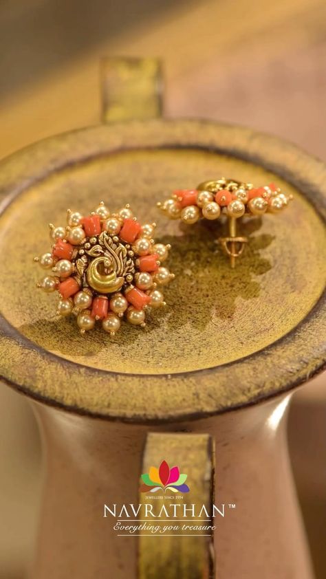 Navrathan Jewellers | An enchanting design,these intricately designed pair of earrings crafted with corel and pearl are a true reflection of elegance.Add a… | Instagram Corals And Pearls Jewellery, Coral Earrings Gold Indian, Pearl Earrings Indian, Navrathan Jewellers, Antique Haram, Tops Earrings, Latest Earrings Design, Coral Jewelry Set, Pearl Earrings Designs