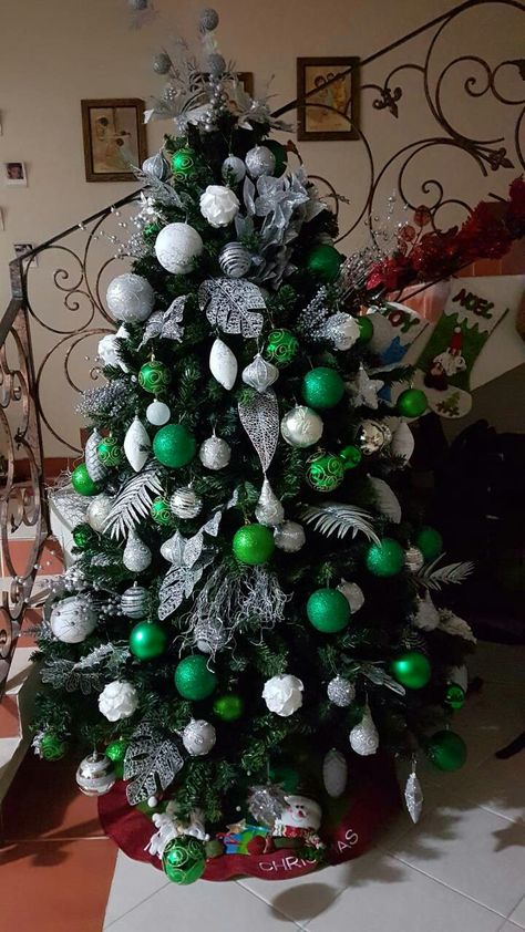 Green and silver christmas tree Christmas Tree Ideas Green And Silver, Green Tree Christmas Decorations, Christmas Tree Silver And Green, Christmas Tree Ideas White And Green, Green And Silver Christmas Tree Ideas, Emerald Green And Silver Christmas Tree, Green White Silver Christmas Tree, Christmas Tree Ideas Green And White, Silver And Green Christmas Decorations