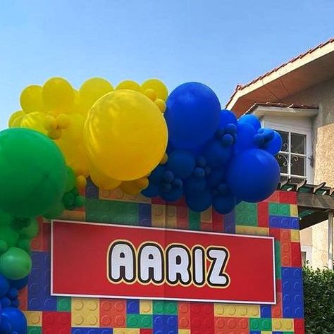 Party World on Instagram: "We absolutely LOVE this Lego theme balloon garland backdrop with a cake table and photo booth set up created by @partyworldpk.events using decorations from @partyworldpk ! ❤️🧡💛💚💙 What do you think of it? • Balloon garland created by @partyworldpk 🎈 • Head over to www.partyworld.pk to buy these decorations and so many more! • #balloongarlandbackdrop #balloongarlandsetup #legobirthday #lego #legotheme #legopartysupplies #legodecorations #partyplates #partycups #partynapkins #birthdaycaps #legoparty #balloongarland #boysbirthday #girlsbirthday #kidsbirthday #specialoccassions #decorations #dressup #party #birthday #theme #partyworldpk #themebirthday #party #balloons #partydecorations" Lego Party Backdrop, Lego Party Banner, Lego Backdrop, Lego Balloons, Balloon Garland Backdrop, Tinkerbell Party Theme, Lego Theme, Lego Decorations, Lego Land