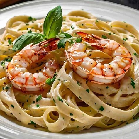 Grilled Argentinian Shrimp Fettuccine Alfredo This grilled Argentinian shrimp for fettuccine alfredo recipe is grilled to perfection with the shrimp served on top of the creamy pasta. The shrimp is lightly charred, with a pink Red Shrimp Recipes, Argentina Shrimp, Argentine Red Shrimp, Argentinian Shrimp, The Simple Wild, Easy Samosa Recipes, Fettuccine Alfredo Recipe, Shrimp Fettuccine Alfredo, Okra Stew