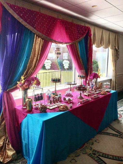 Bollywood Gorgeous  | CatchMyParty.com Princess Jasmine Bridal Shower Ideas, Bollywood Decorations, Bollywood Theme Party Decoration, Bollywood Party Decorations, Arabian Nights Theme Party, Bollywood Birthday, Aladdin Wedding, Arabian Party, Jasmine Birthday Party