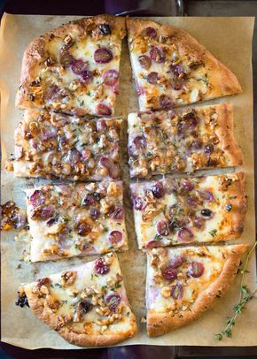 It's amazing what you can do with a pound of pizza dough. Of course you can make a traditional pizza, but why not get a little more creative? This easy flatbread, which can do double duty as an appetizer or as a full meal, has a fun combination of grapes, Taleggio cheese, and walnuts — all on whatever pizza dough you like best. Chicken In Milk, Best Chicken Recipe, Taleggio Cheese, Easy Flatbread, Cheese Flatbread, Pizza Flatbread, Flatbread Recipes, Flatbread Pizza, Great Appetizers