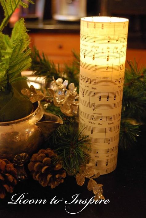 sheet music candles Music Theme Christmas Decorations, Music Themed Christmas Decor, Music Centerpieces, Music Candle, Pillar Candles Wedding, Sheet Music Crafts, Candle Wrap, Music Crafts, Music Decor