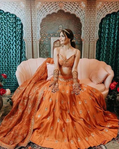 Fresh Bridal Lehenga Colours That We Spotted On The Gram Lately! | WeddingBazaar Unique Mehendi Outfits For Bride, Lehenga Colours, Mehendi Outfits For Bride, Indian Fits, Royal Indian Wedding, Ceremony Outfit, Orange Lehenga, Indian Designers, Shadi Dresses