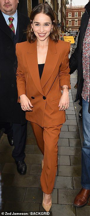 Terracotta Trousers Outfit, Emelia Clarke Style, Terracotta Suit Women, Emilia Clarke Color Season, Emilia Clarke Casual, Emilia Clarke Street Style 2022, Terracotta Suit, Black Vest Top, Trouser Suit