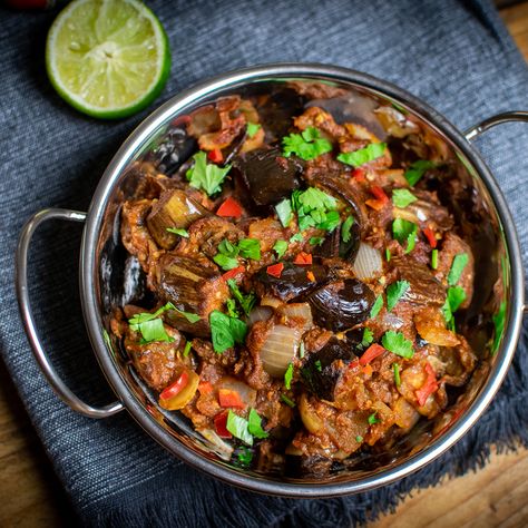 Aubergine bhaji, or brinjal bhaji, is a classic Indian side dish that pairs the rich, creaminess of aubergines with fragrant garam masala and cumin. Onion Bhaji, Indian Side Dishes, Bhaji Recipe, Baba Ganoush, Vegan Curry, Crispy Onions, Best Vegan Recipes, Indian Spices, Indian Cooking