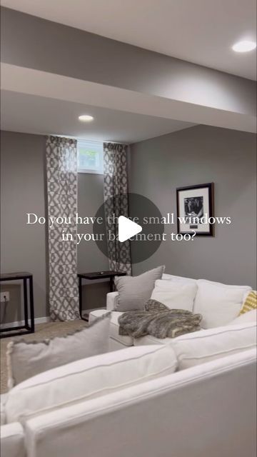 Kristel Gillies on Instagram: "I know I can’t stand them either 🙄  and I regret not adding egress windows, but here we are.  I tried hanging curtains to mask them, putting large mirrors under them, and adding shutter below to pretend the window is actually large.  Instead of decorating to hide the hopper windows, intentionally incorporate them into your structural design.  You can find the whole renovation process of our basement saved in highlights!" How To Decorate Basement Windows, Curtains In Basement, Small Basement Window Ideas, Fake Windows Basement, Basement Window Coverings, Basement Window Curtains, Basement Window Treatments, Remote Blinds, Small Window Treatments