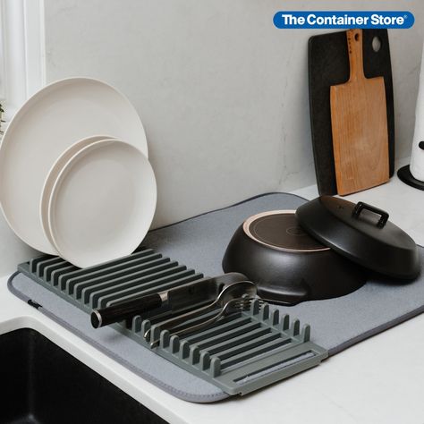 A sleek update on the traditional dish rack, our UDry Drying Rack combines an absorbent drying mat with removable dish holder in one convenient design. Simply unfold the thick microfiber mat and position the dish drying rack any way you want. Then stack plates, pots, glasses and utensils to dry. Lighter than old drainer racks, both the mat and dish rack separate completely for easy cleaning. Together, they fold flat and can be secured with sewn-in elastic straps for compact storage. Kitchen Sink Organizers, Culinary Techniques, Dish Holder, Condo Kitchen, Dish Drainers, Dish Rack, Sink Organizer, Organize Drawers, Dish Rack Drying