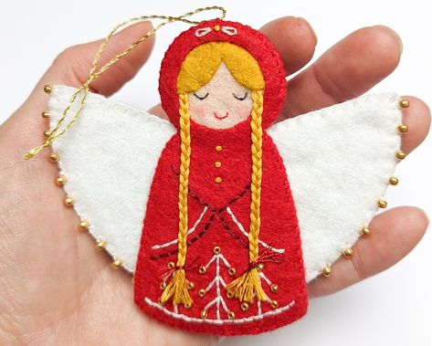 This Tutorials item by LilPuddingPatterns has 298 favorites from Etsy shoppers. Ships from United States. Listed on Sep 5, 2024 Felt Angel Ornaments, Finger Gym, Felt Angel, Felt Ornaments Patterns, Felt Sewing, Felt Ideas, Pretty Embroidery, Cosy Christmas, Felt Embroidery