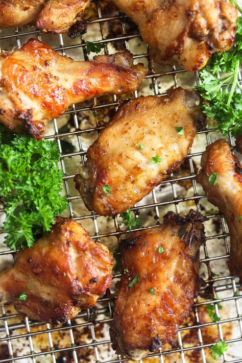 Garlic butter chicken wings, these crispy baked chicken wings make a perfect party appetizer. Ready in about 40 minutes. #thefastrecipe #garlicbutter #butterwings #garlicwings #chickenwings #gameday #footballrecipes #foodballfood #wingsappetizer #appetizers #footballappetizers #chickenrecipes #spicywings #foodrecipes #yummyfood #bestrecipes #bestchickenwings Butter Wings Recipe, Butter Garlic Wings, Baked Chicken Wings Recipes, Garlic Butter Chicken Wings, Chicken Wings Recipe Oven, Spicy Baked Chicken Wings, Butter Chicken Wings, Chicken Wings In The Oven, Garlic Chicken Wings Recipe