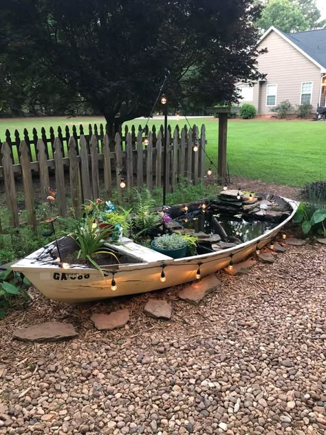 Dock Ideas Pond, Boat Ponds Ideas, Old Boat Pond, Farm Pond Dock Ideas, Canoe Water Garden, Canoe Fish Pond, Lake Cabin Landscaping Ideas, Small Outdoor Pond Ideas, Water Lily Garden