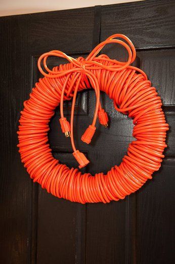 I need to make a couple of these!  Man wreath... I think I might do this in Christmas colors. That way he has a way to plug all his christmas lights in without all the extra cords hanging around Too funny mancave wreath Tacky Christmas, Construction Birthday Parties, Construction Party, Father's Day Diy, Construction Birthday, Wreath Crafts, Idea Diy, Diy Wreath, Christmas Colors