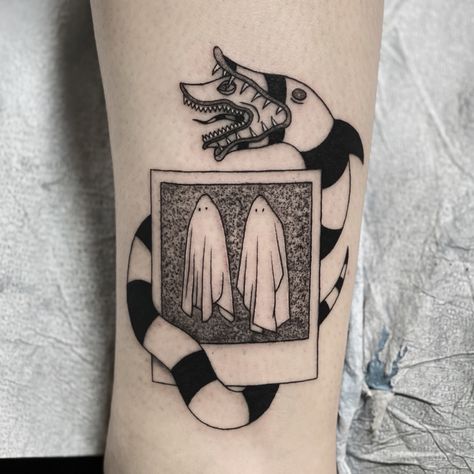 instagram: rossphillipstattoo Movie Themed Tattoos Sleeve, Sand Snake Tattoo Beetlejuice, Horror Movie Couple Tattoos, Beetlejuice Polaroid Tattoo, Tim Burton Style Tattoo Ideas, Tim Burton Fine Line Tattoo, Beetlejuice Inspired Tattoos, Beetlejuice No Feet Tattoo, Hellraiser Box Tattoo