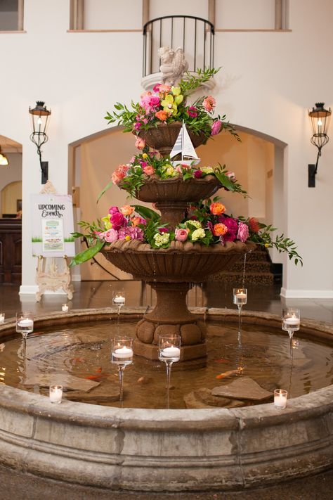 wedding fountain #weddingflorals #fountain #brightflorals Water Fountain With Flowers, Fountain Decoration Ideas, Wedding Fountain, Elegant Mexican Wedding, Classic Ballroom Wedding, Garden Party Theme, Garden Lamp, Waterfall Fountain, Water Fountains Outdoor