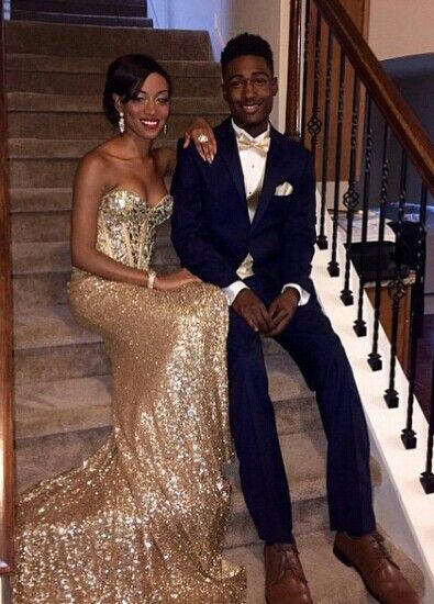 Gold Prom Fits Men, Tux To Match Gold Prom Dress, Navy Blue And Gold Prom Couple, Gold Dress Matching Couple, Prom Coordinating Outfits, Gold Prom Dress And Suit, Gold Prom Look Couple, Gold And White Prom Couple, Navy Blue And Gold Prom Dress