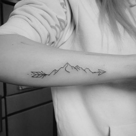 Simple And Sweet Mountain Arrow Tattoo Tattoo Ideas Mountains Simple, Arrow With Mountains Tattoo, Mountain And Arrow Tattoo, Horizontal Mountain Tattoo, Mountain Arrow Tattoo, Forearm Mountain Tattoo, Mountain Band Tattoo, Feather Arrow Tattoo, Infinity Arrow Tattoo