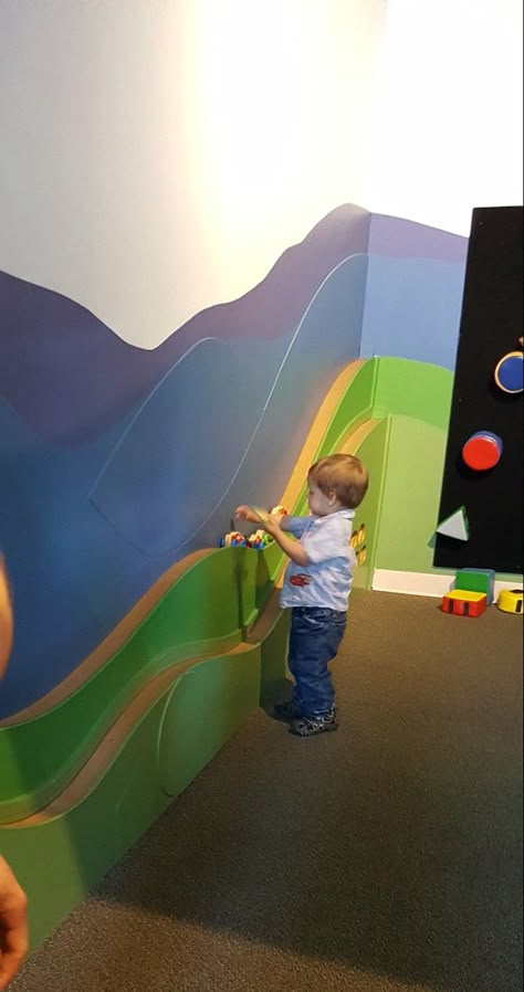 Car track built into wall Indoor Playground Design, Indoor Playroom, Kindergarten Interior, Daycare Design, Kids Cafe, Kids Basement, Bar Basement, Church Nursery, Sensory Room