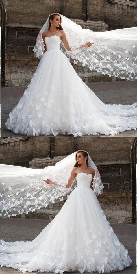 Strapless wedding gown with long train and long veil, butterfly detail Gwen Stefani Wedding Dress, Wedding Dresses With Long Train, Butterfly Simple, Simple Bridal Gowns, Buy Wedding Dress, Long Train Wedding Dress, Fall Wedding Guest Dress, Beautiful Wedding Gowns, Trendy Wedding Dresses