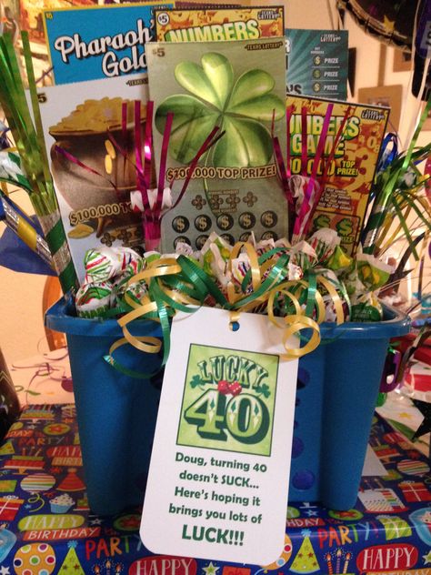 40th Birthday gift for my husband--a Dollar Tree basket with foam and tissue paper filled with Blow Pop suckers and $40 worth of scratch off lotto tickets. Lottery Ticket Bouquet, 40th Birthday Ideas, Gift Card Basket, 40th Birthday Themes, 40th Birthday Men, 40th Bday Ideas, 30th Birthday Decorations, Baskets For Men, Bff Birthday Gift