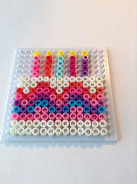 Birthday cake perler beads Birthday Cake Perler Beads, Birthday Perler Bead Patterns, Perler Beads Birthday, Birthday Perler Beads, Cake Perler Beads, Melty Bead Designs, Melt Beads Patterns, Pony Bead Projects, Hamma Beads Ideas