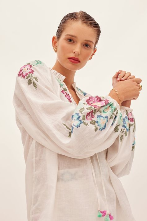 The Esparto Tassel Blouse in Itzel Embroidery, a Kate Ford exclusive hand-drawn embroidery from our Spring Summer 2024 Collection, Boteh. A light weight linen blouse featuring a self neck tie with custom KATE FORD tassels, embroidered open neckline and collar frill with elegant puff embroidered sleeves and elasticated cuffs.- Kate Ford exclusive embroidery- Light weight linen fabric- Self neck tie- Custom tassels- Collar frill- Puff sleeves, elasticated cuffs Model is wearing a size 1, you can view our size guide at https://kateford.com.au/pages/sizing NOTE: All embroideries are exclusive to Kate Ford and all garments are uniquely made, meaning each embroidery placement will look different to the images shown. If you have any questions about this, please email customer care at customercare Kate Ford, Cuff Embroidery, Embroidery Placement, Embroidery Light, Tassel Blouse, Fashion Top Outfits, Embroidered Sleeves, Desi Girl, Spring Summer 2024