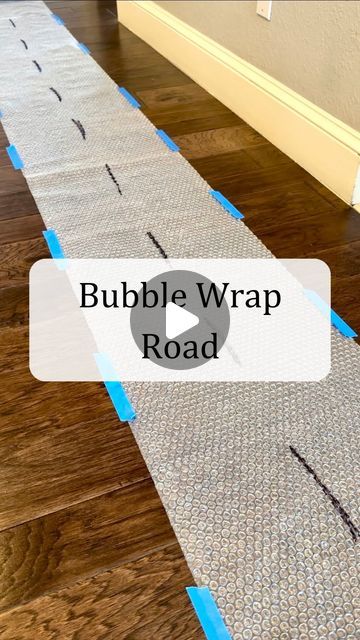 Jordan | Occupational Therapist | Baby & Toddler Play on Instagram: "Next time you get bubble wrap in a package… SAVE it!!!   Bubble wrap runway/road  is magical. Trust me on this one. It’s simple, inexpensive ( if not free!), and it promotes development. Kids love this.   Bubble wrap provides a unique kind of auditory, tactile, and proprioceptive input.   Let your child use their fingers to pop it- great for hand strengthening and fine motor skills!   Encourage them to jump, stomp or do silly animal walks (bear crawl, crab walk) down the bubble wrap- this provides proprioceptive feedback and promotes gross motor skills!   Use all the fun toy cars or even toy animals to walk or race down the road. The possibilities are endless.   Save this for later and send to a friend! ❤️ @teachersloveha Bubble Wrap Games, Animal Walks, Proprioceptive Input, Hand Strengthening, Toddler Lessons, Bear Crawl, Lesson Plans For Toddlers, Send To A Friend, Toy Animals