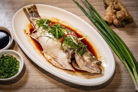 Steamed Whole Fish and the Ginger, Garlic, Scallion Trifecta Steamed Whole Fish, Steamed Fish Recipes, New Year Food, Lucky Food, Chinese New Year Food, Whole Fish, Food Fish, Best Chinese Food, Steamed Fish