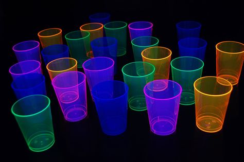 PRICES MAY VARY. 100 tall bodied blacklight reactive 10 ounce cups per set Ideal for glow parties, birthdays, holidays, festivals, themed events and so much more! Cups are disposable, but can be carefully hand washed for multiple uses Each set of cups purchased includes 5 free blacklight balloons Blacklight responsive ONLY. Cups do NOT glow without a blacklight Our tall 10oz disposable neon blacklight cups are a must have for any glow party using blacklight. Hard plastic has some flex to withsta Glow Birthday Party Ideas, Blacklight Halloween, Cup Pong, Neon Birthday Party, Glow Birthday Party, Glow Jewelry, Neon Birthday, Glow Birthday, Glow Party