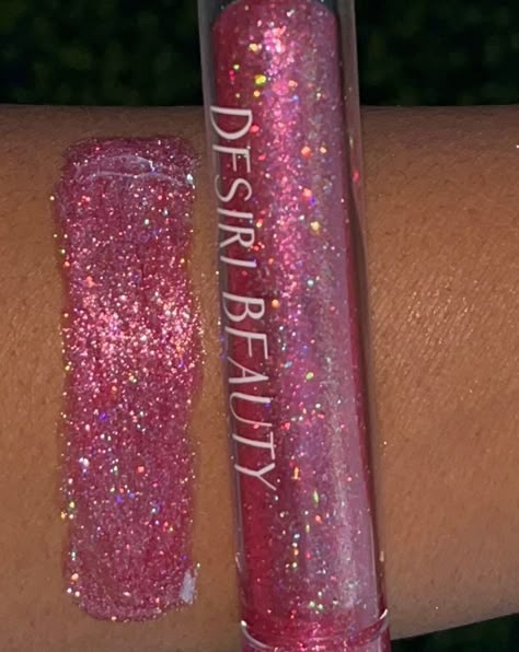 A statement, high-shine, holographic, Multichrome lip gloss. It. This holographic gloss will shine with or without illumination. A Perfect gift for graduation, birthdays, Anniversary, weddings, Christmas gift, Gift for her. NET WT: 3.2g * Smooth velvety texture  * Long wear * Glossy finish * Unscented * Cruelty Free Vegan Formula Processing: 1 business day