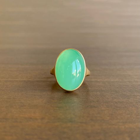 An enchanting combination of glowing green chrysoprase and sumptuous yellow gold. 18k yellow gold Chrysoprase, 10.85 carats, 12mm x 17mm (1/2" x 11/16") Maximalist Jewelry, Modern Rings, Chrysoprase Jewelry, Chrysoprase Ring, Newport Rhode Island, Green Chalcedony, Newport Ri, Etsy Gold Ring, Dope Jewelry